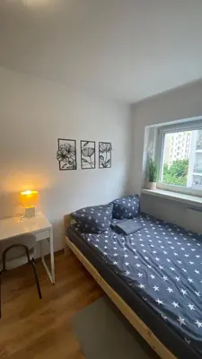 Łóżko lub łóżka w pokoju w obiekcie Rooms In Warsaw - C106B