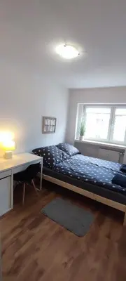 Łóżko lub łóżka w pokoju w obiekcie Rooms In Warsaw - C106B