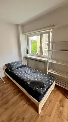 Łóżko lub łóżka w pokoju w obiekcie Rooms In Warsaw - C106B