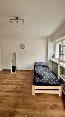 Łóżko lub łóżka w pokoju w obiekcie Rooms In Warsaw - C106B