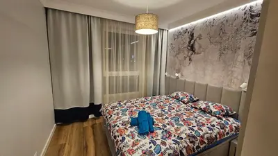 Łóżko lub łóżka w pokoju w obiekcie Apartament Elegance, Metro, free parking