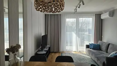 Telewizja i/lub zestaw kina domowego w obiekcie Apartament Elegance, Metro, free parking