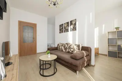 Część wypoczynkowa w obiekcie Cozy & Comfortable Apartment Grodeckiego by Noclegi Renters
