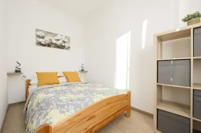 Łóżko lub łóżka w pokoju w obiekcie Cozy & Comfortable Apartment Grodeckiego by Noclegi Renters