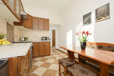 Kuchnia lub aneks kuchenny w obiekcie Cozy & Comfortable Apartment Grodeckiego by Noclegi Renters