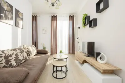Telewizja i/lub zestaw kina domowego w obiekcie Cozy & Comfortable Apartment Grodeckiego by Noclegi Renters
