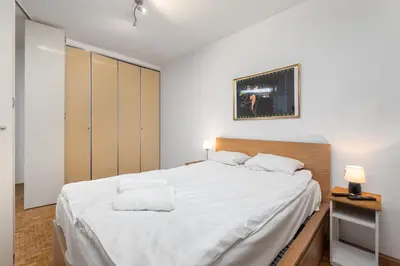 Łóżko lub łóżka w pokoju w obiekcie Szlenkierów 1 by Homeprime
