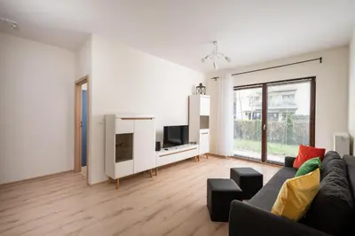 Telewizja i/lub zestaw kina domowego w obiekcie Royal Wilanów Apartment with Garden by BookingHost