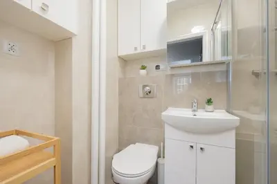 Łazienka w obiekcie Apartment in the Heart of Warsaw by Noclegi Renters