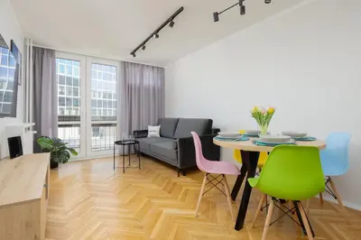 Część wypoczynkowa w obiekcie Apartment in the Heart of Warsaw by Noclegi Renters