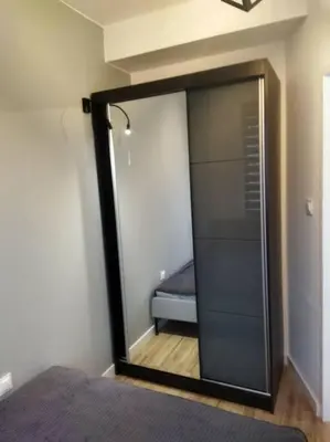Łóżko lub łóżka w pokoju w obiekcie Apartament Nova Ochota A/C Park Place