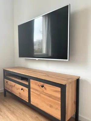 Telewizja i/lub zestaw kina domowego w obiekcie Olo Apartment