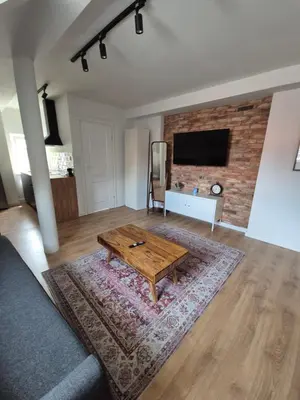 Telewizja i/lub zestaw kina domowego w obiekcie Old Tenement Apartment