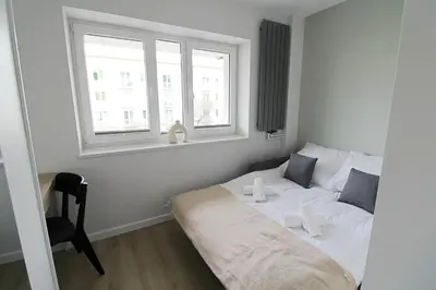 Łóżko lub łóżka w pokoju w obiekcie Nowolipie 31 - Bezpłatny parking - free parking - Better Rental