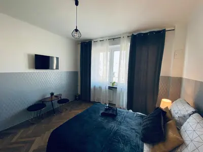 Łóżko lub łóżka w pokoju w obiekcie ClickTheFlat Plac Bankowy Apart Rooms
