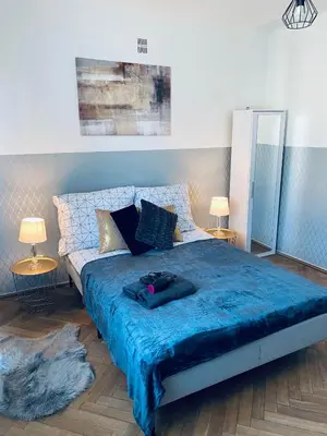 Łóżko lub łóżka w pokoju w obiekcie ClickTheFlat Plac Bankowy Apart Rooms