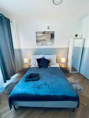 Łóżko lub łóżka w pokoju w obiekcie ClickTheFlat Plac Bankowy Apart Rooms