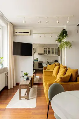 Telewizja i/lub zestaw kina domowego w obiekcie Relax Apartment Hoża