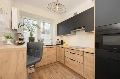 Kuchnia lub aneks kuchenny w obiekcie Family Unique Apartment for 4 people in Warsaw Wola by Noclegi Renters