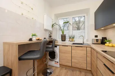 Kuchnia lub aneks kuchenny w obiekcie Family Unique Apartment for 4 people in Warsaw Wola by Noclegi Renters