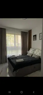 Łóżko lub łóżka w pokoju w obiekcie Apart Wola