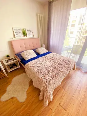 Łóżko lub łóżka w pokoju w obiekcie HomeComfort Apartament Sweet Heart