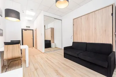 Część wypoczynkowa w obiekcie Aleje Jerozolimskie 216 by Homeprime