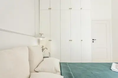 Łóżko lub łóżka w pokoju w obiekcie BlueBerry Apartment