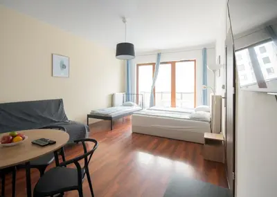Łóżko lub łóżka w pokoju w obiekcie Rooms Green Rydygiera 17 own room tv wifi