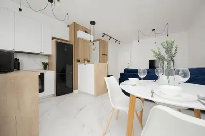 Kuchnia lub aneks kuchenny w obiekcie Stylish Apartments with Parking by Noclegi Renters