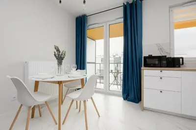 Kuchnia lub aneks kuchenny w obiekcie Stylish Apartments with Parking by Noclegi Renters