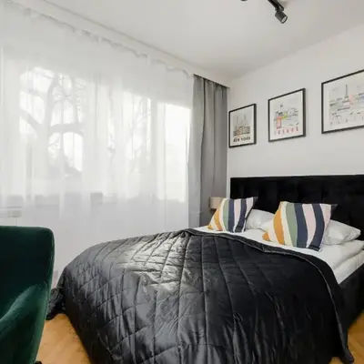 Modern Black & Wooden Apartment Warsaw Near The Airport by Noclegi Renters