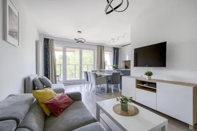 Telewizja i/lub zestaw kina domowego w obiekcie Labo Apartment Soho Mińska