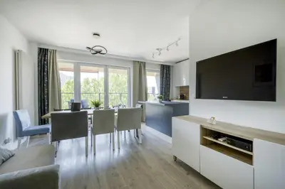 Telewizja i/lub zestaw kina domowego w obiekcie Labo Apartment Soho Mińska