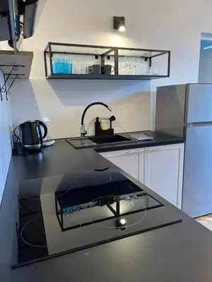 Kuchnia lub aneks kuchenny w obiekcie Apartamenty centrum