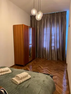 Łóżko lub łóżka w pokoju w obiekcie Apartamenty centrum