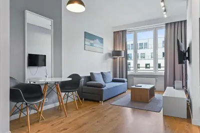 Telewizja i/lub zestaw kina domowego w obiekcie RentPlanet - Apartament Sławińska