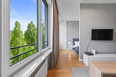 Telewizja i/lub zestaw kina domowego w obiekcie RentPlanet - Apartament Sławińska