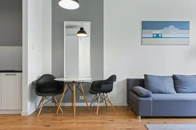 Część wypoczynkowa w obiekcie RentPlanet - Apartament Sławińska