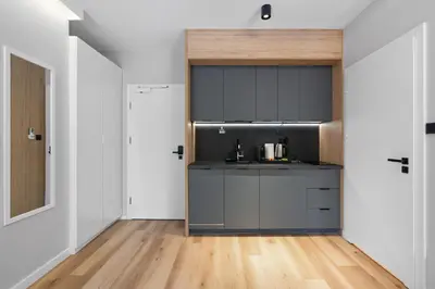 Kuchnia lub aneks kuchenny w obiekcie Apartamenty Modra Warszawa