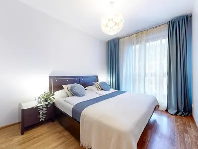 Łóżko lub łóżka w pokoju w obiekcie Pineapple Apartment Ochota 3 Rooms, AC, Parking