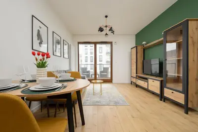 Kuchnia lub aneks kuchenny w obiekcie Apartment with Parking and Balcony in Mokotów by Noclegi Renters