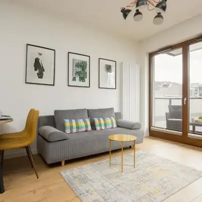 Apartment with Parking and Balcony in Mokotów by Noclegi Renters