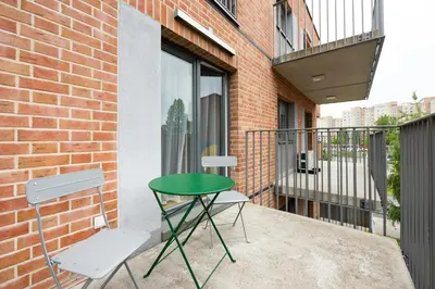 Balkon lub taras w obiekcie Wileńska Express Chic Apartment by BookingHost