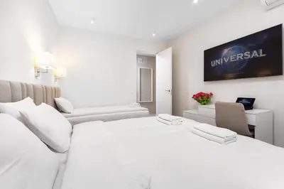 Łóżko lub łóżka w pokoju w obiekcie Apartament Krucza by Your Freedom