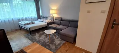 Łóżko lub łóżka w pokoju w obiekcie Warsaw Centrum Apartment