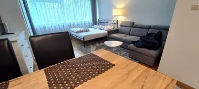 Łóżko lub łóżka w pokoju w obiekcie Warsaw Centrum Apartment
