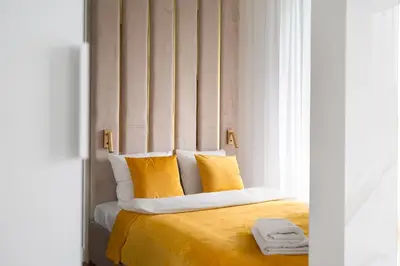 Łóżko lub łóżka w pokoju w obiekcie Urban Apartaments - Great Location - City Center - Grzybowska 37