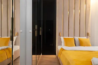 Łóżko lub łóżka w pokoju w obiekcie Urban Apartaments - Great Location - City Center - Grzybowska 37
