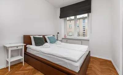 Łóżko lub łóżka w pokoju w obiekcie Fabryczna 23 by Homeprime